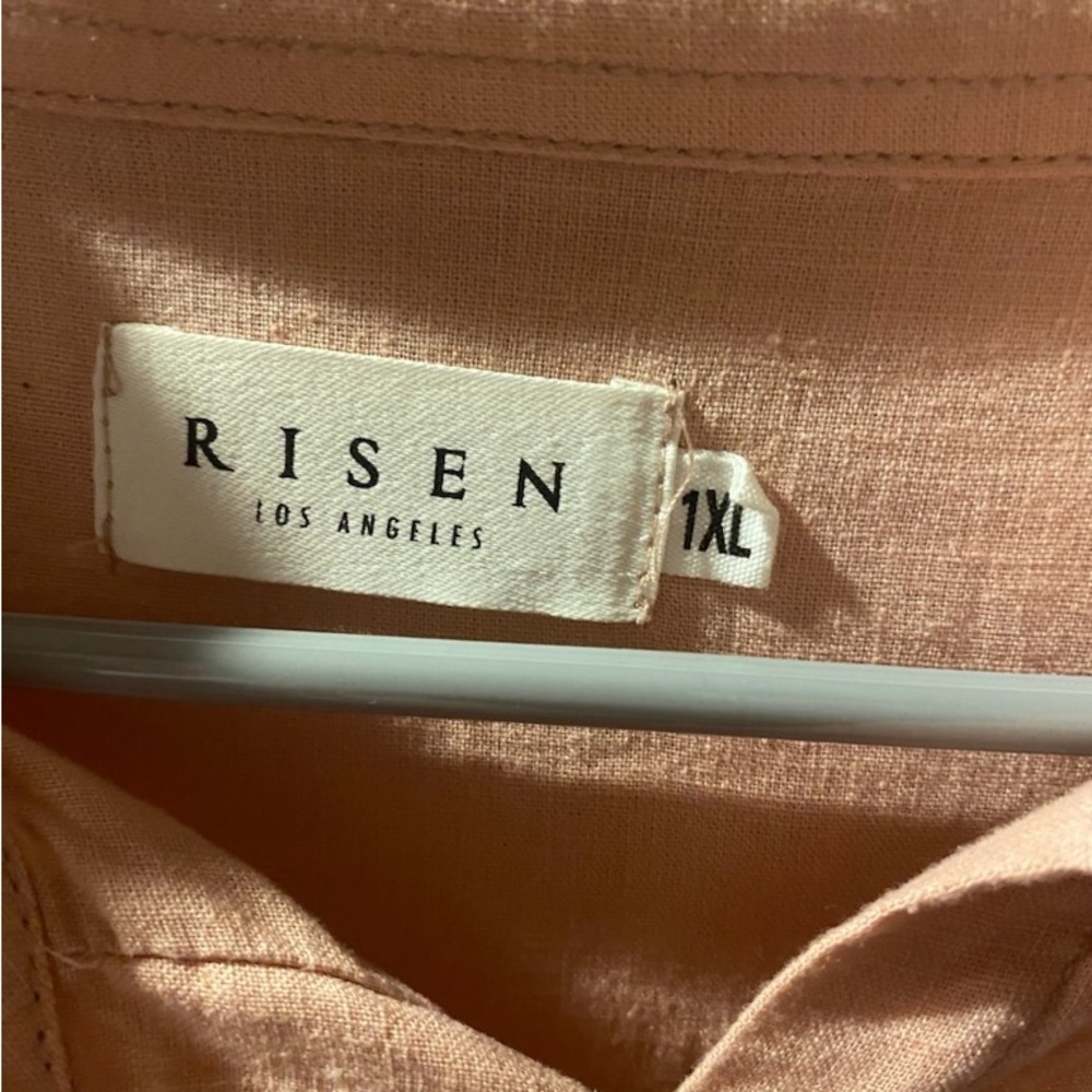 Long sleeved button up shirt. Matches jean jacket also listen